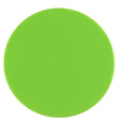 Hot glue gun hovers over a round green Surebonder silicone pad, measures 4 inches diameter