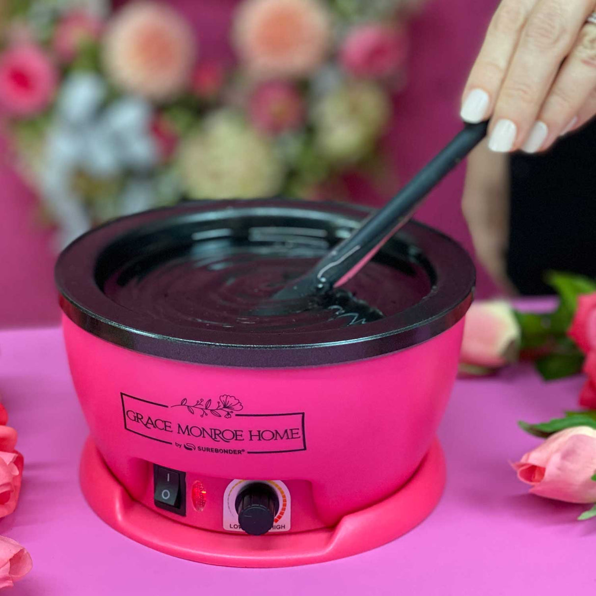 Use the non-stick stir sticks to stir the melted glue in the skillet