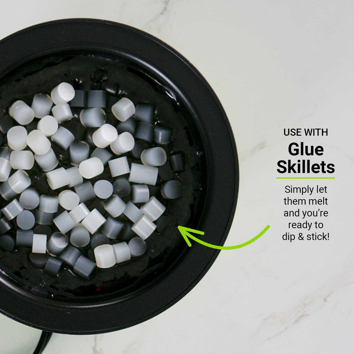 glue pellets melting in heated glue skillet