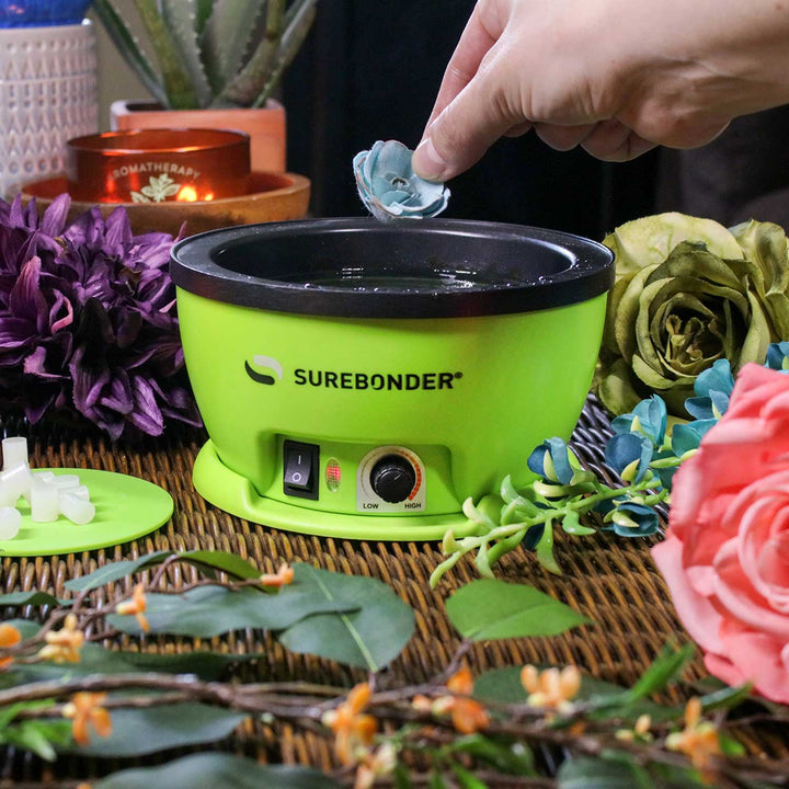 flowers dipping into the Surebonder adjustable temperature glue skillet